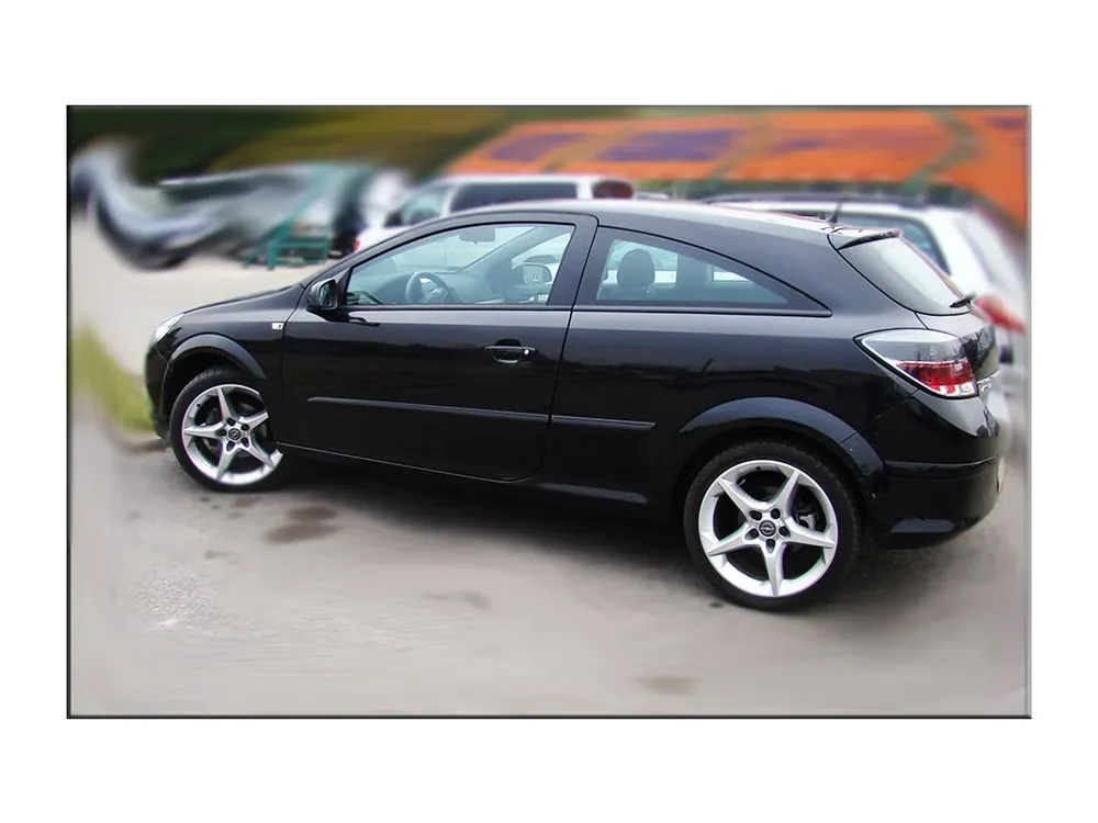 Sleva Boční ochranné lišty dveří Opel Astra III GTC 05R-->11R